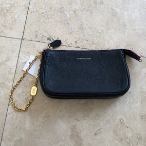 Stuart Weitzman navy blue leather wristlet/clutch